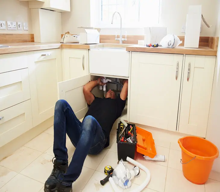 Main carrying out kitchen plumbing repair Glasgow